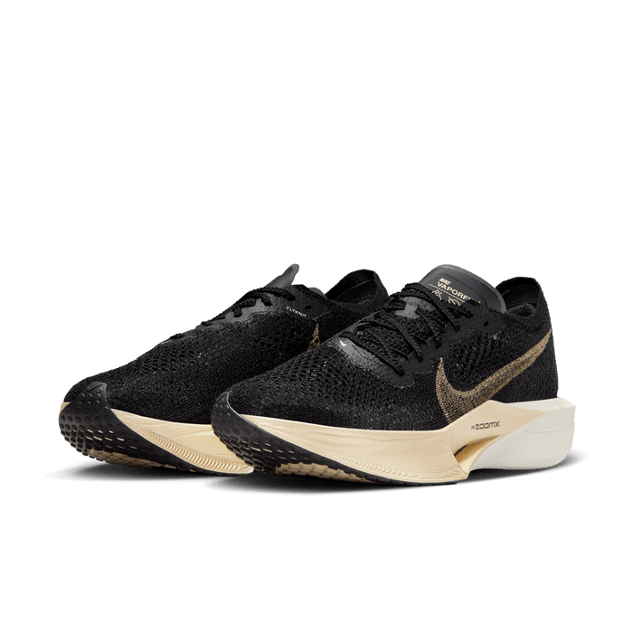 Nike zoom 2025 black gold